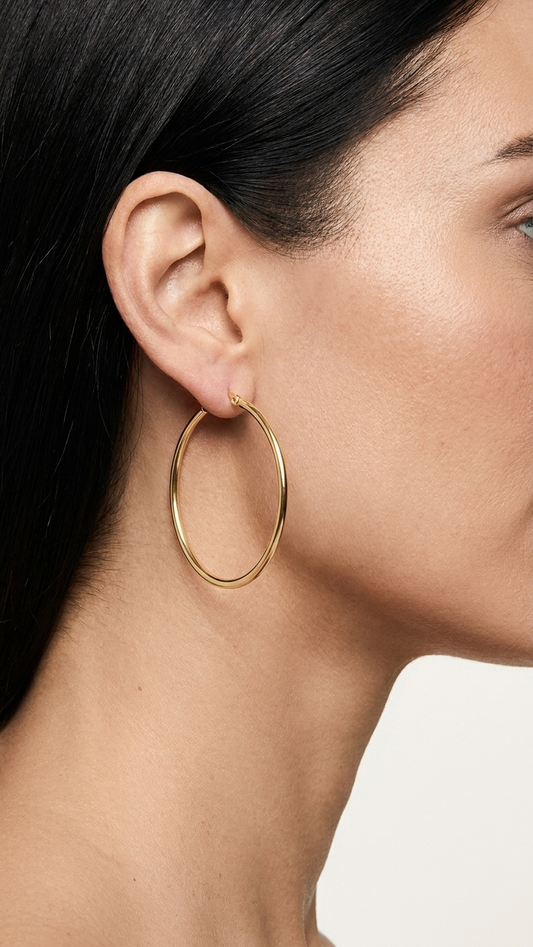 Cassia 9k yellow gold creole earrings worn on the ear, side profile, Luma Jewellery