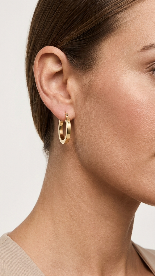 Fern 9k yellow gold hoop earrings worn on the ear, side profile, Luma Jewellery