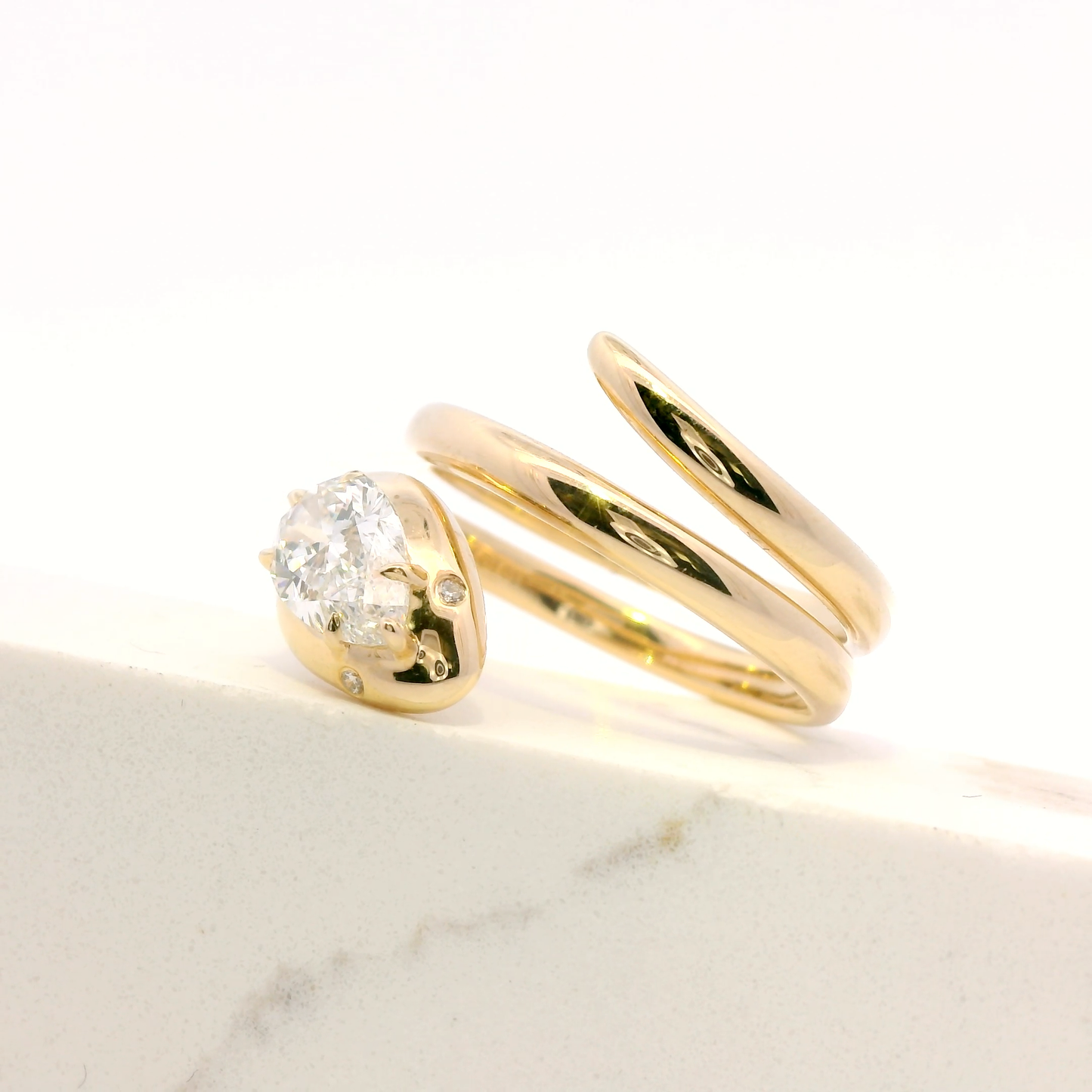 Lira serpent ring with pear cut lab grown diamond, 14k yellow gold, Luma Jewellery