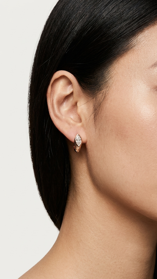 Sarra gold diamond stud earrings worn on the ear, side profile, Luma Jewellery