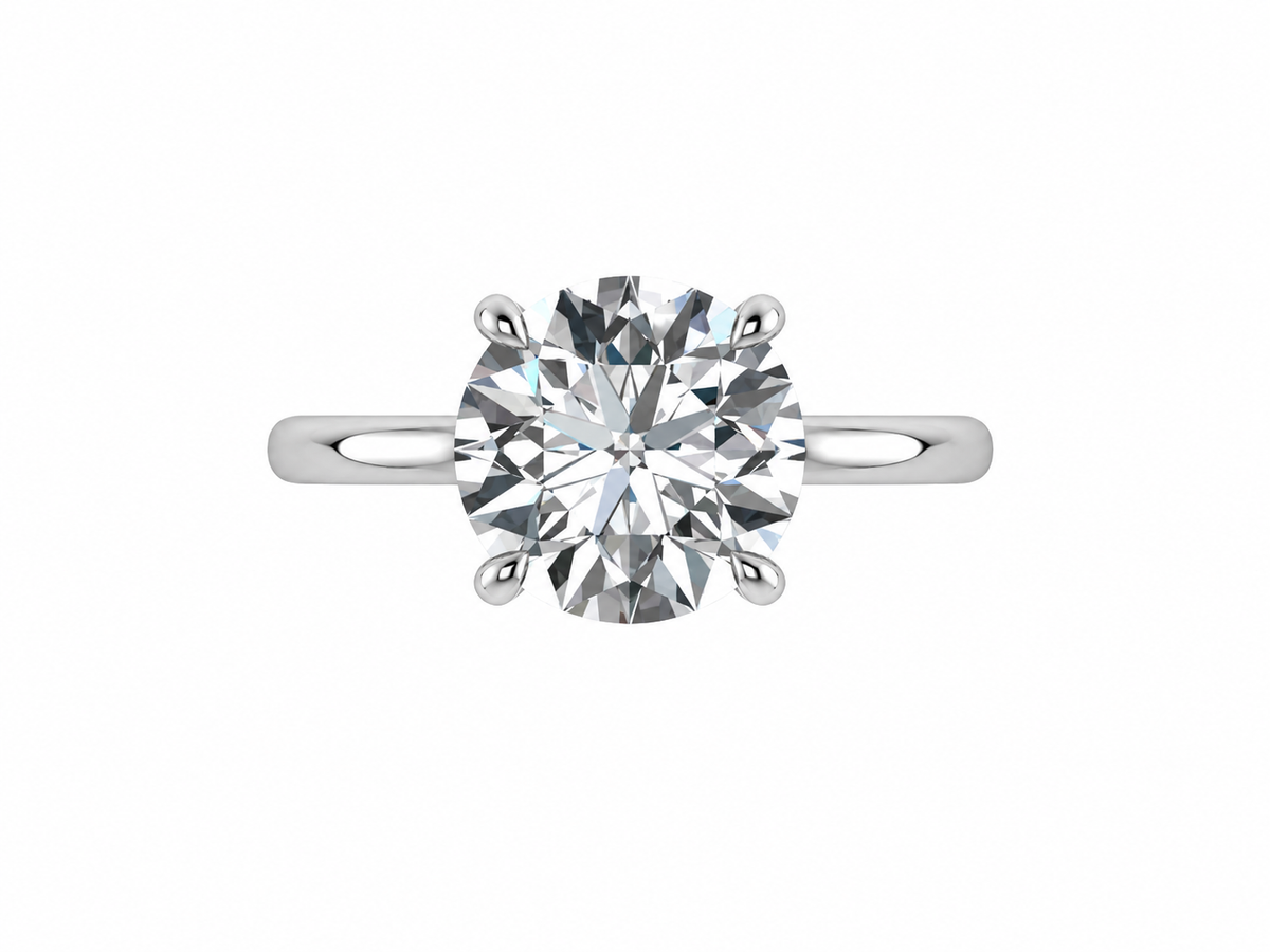 The Cheyanne - Bespoke Round Brilliant Solitaire with hidden halo
