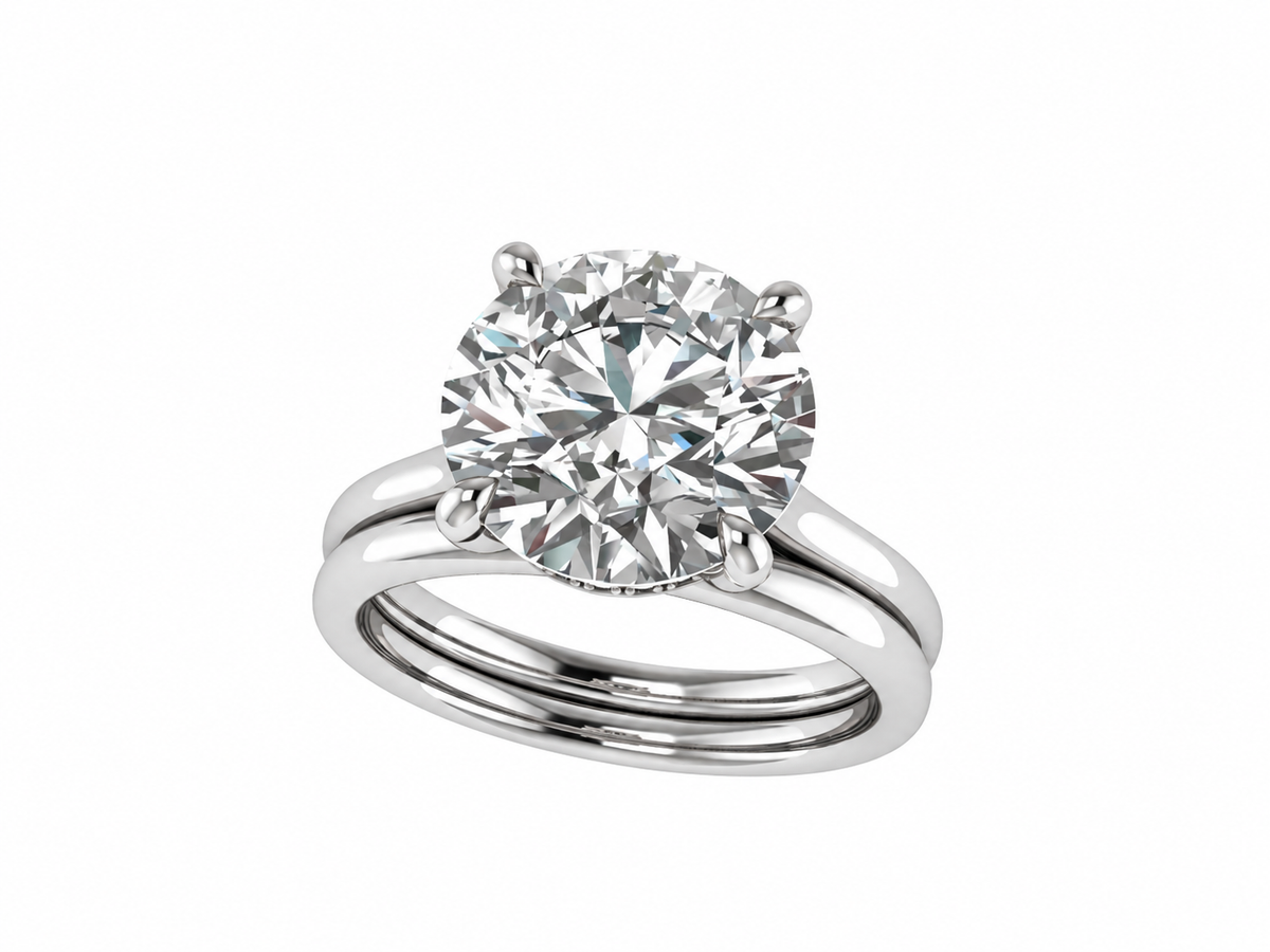 The Cheyanne - Bespoke Round Brilliant Solitaire with hidden halo