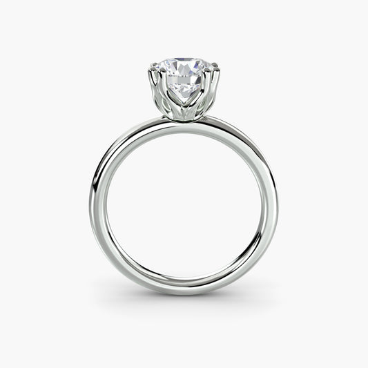 Astrid engagement ring setting with round cut diamond in white gold, top view, Luma Jewellery