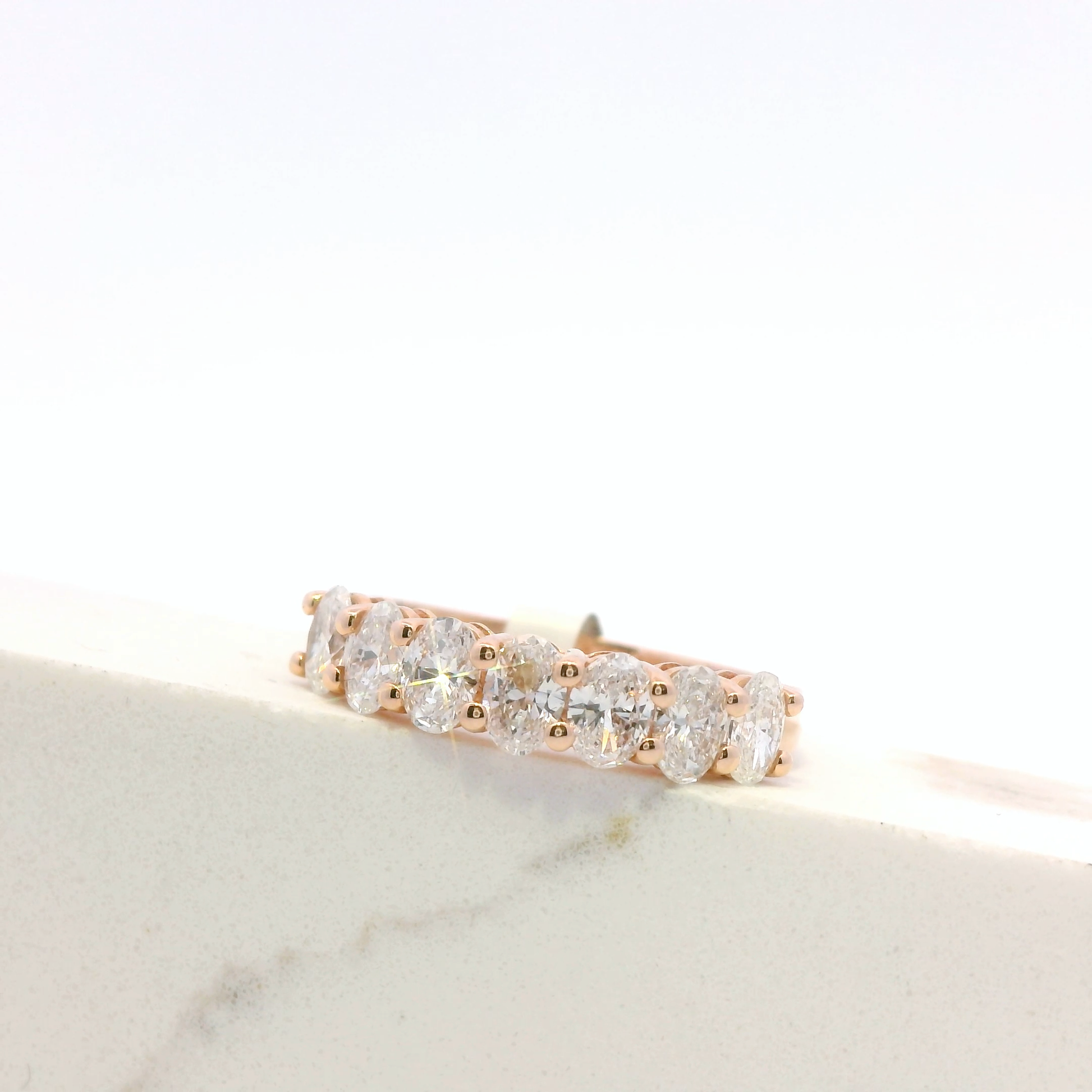 Celine half-eternity oval diamond ring, side view, rose gold, Luma Jewellery