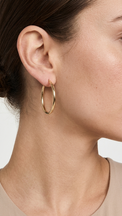 Clementine 9k yellow gold hoop earrings worn on the ear, side profile, Luma Jewellery