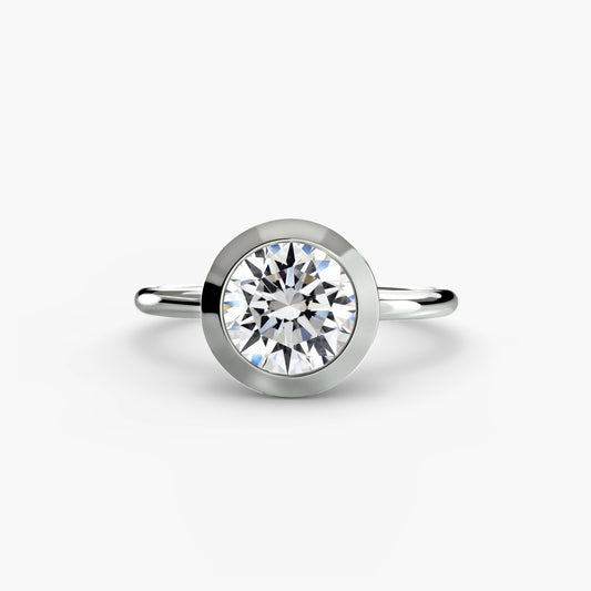 Clio engagement ring setting with round cut diamond in platinum, front view, Luma Jewellery