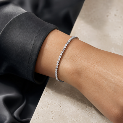 Corisande platinum under-lock Diamonds (LG) tennis bracelet worn on the wrist