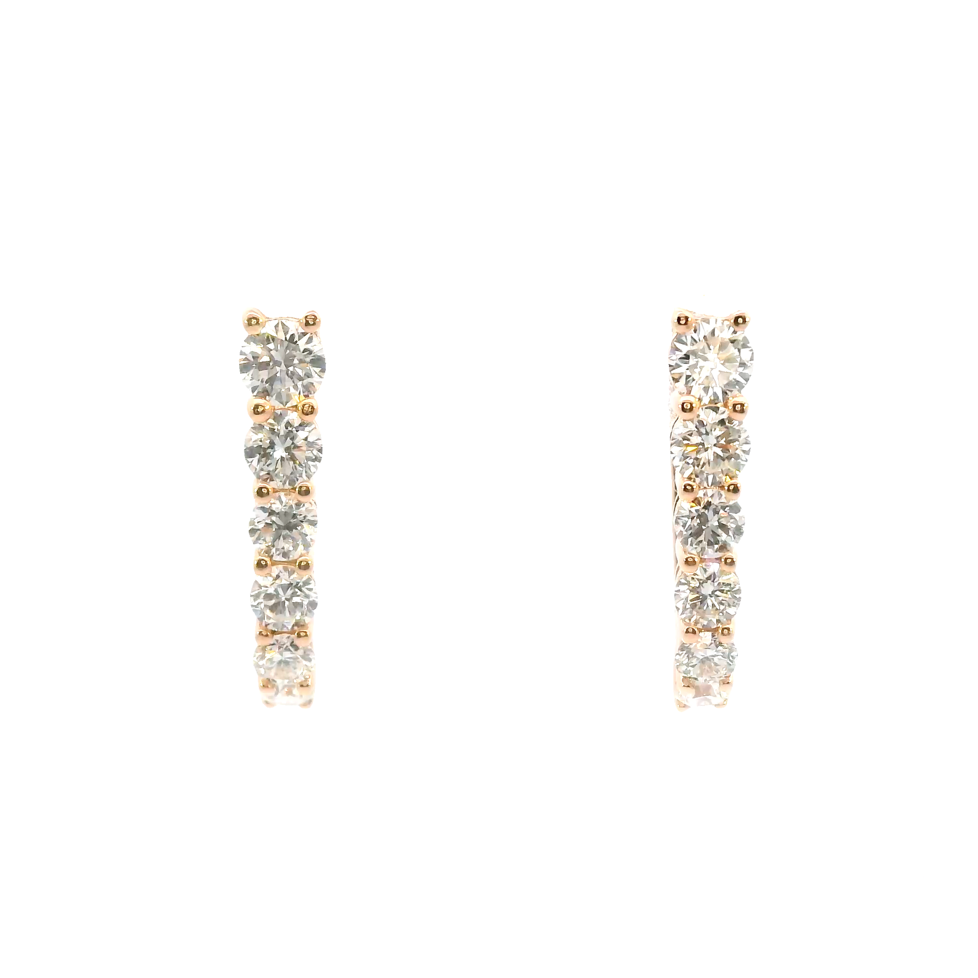 Pair of diamond earrings on a white background