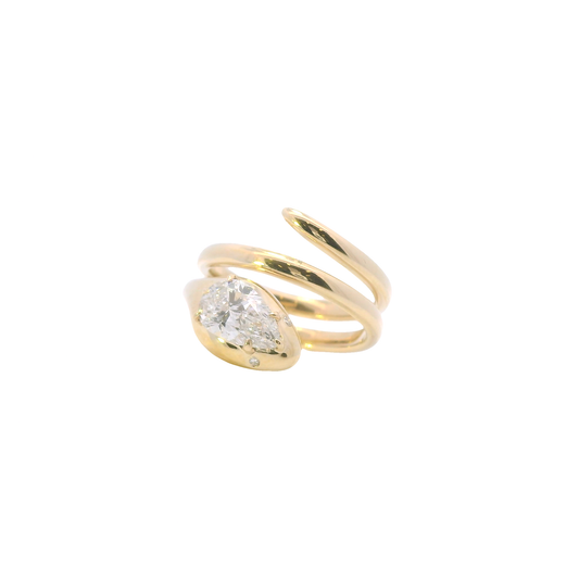 Gold ring with a diamond on a white background