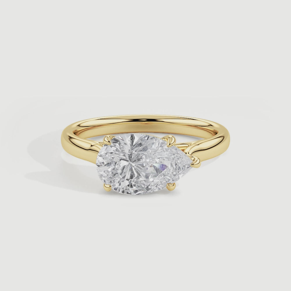 Clara East-West Pear Diamond Solitaire Ring in 9k Yellow Gold