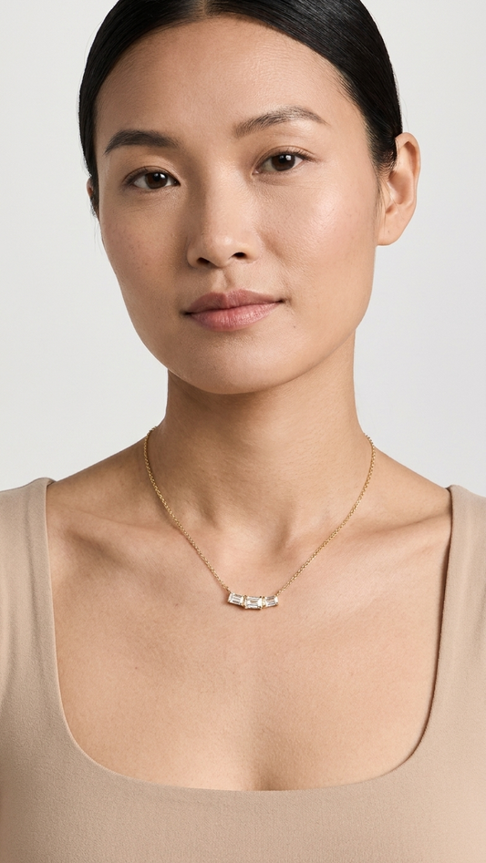 Roux yellow gold diamond necklace worn at the neckline, Luma Jewellery