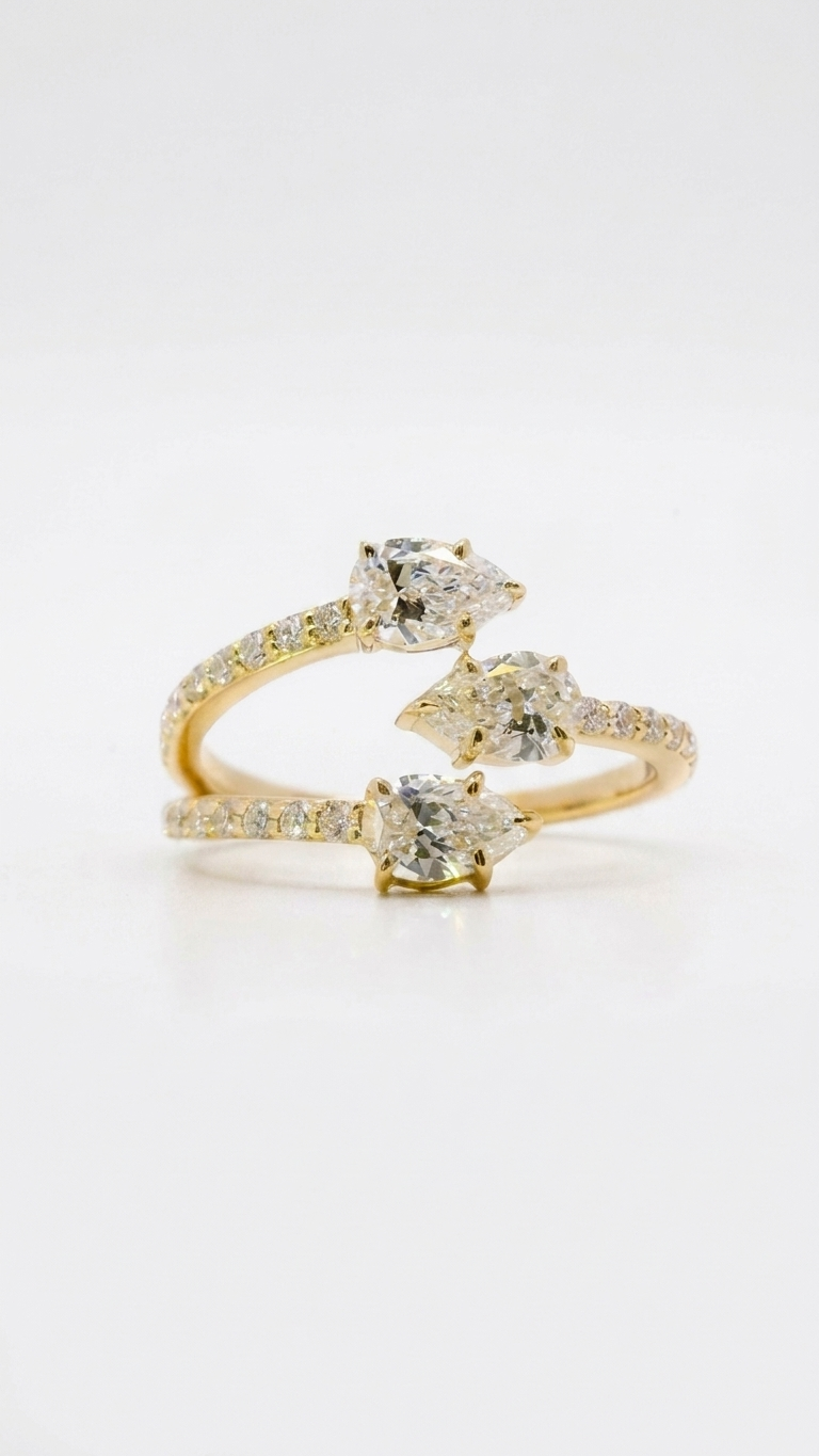 Salma pear cut diamond serpent ring in yellow gold, Luma Jewellery