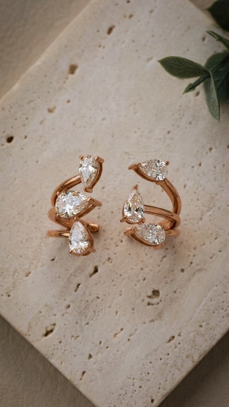 Sapphira pear cut diamond ring in 14k rose gold, side view, Luma Jewellery