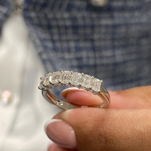 Solenne emerald cut half-eternity ring, yellow gold, Luma Jewellery