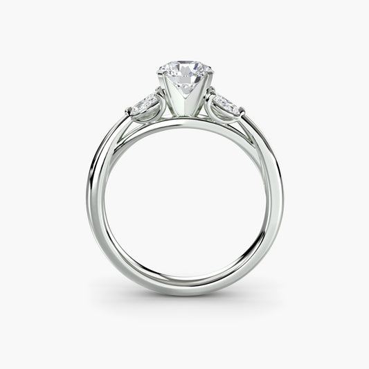 Vega engagement ring setting with round cut diamond in white gold, side view, Luma Jewellery